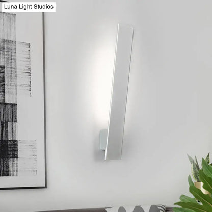 White aluminum wall sconce by Decorbites with slim vertical design, wall-mounted lighting on Tampa Home & Garden Store