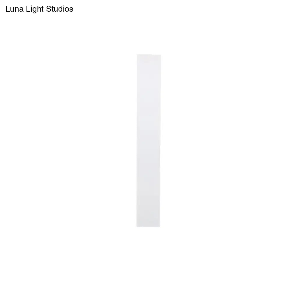 White aluminum wall sconce by Decorbites, modern minimalist home lighting on Tampa Home & Garden Store