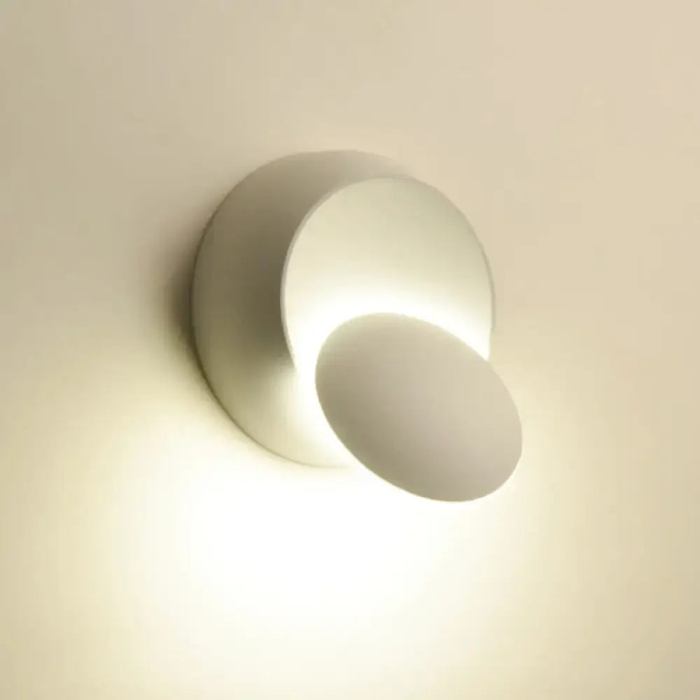 Black circular LED stairway wall lamp by Decorbites on wall on Tampa Home & Garden Store