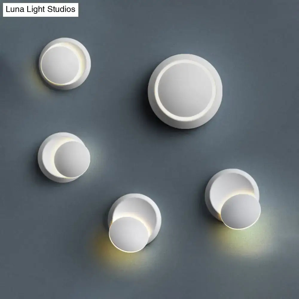 White circular LED stairway wall lamps by Decorbites, five round disc lights with warm glow on Tampa Home & Garden Store