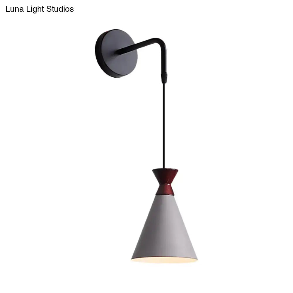 Black conical iron minimalist sconce with white shade and red connector by Decorbites on Tampa Home & Garden Store