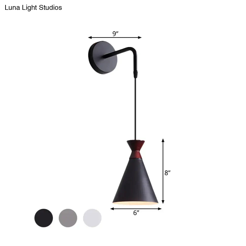 Decorbites black conical iron minimalist wall sconce with 9in arm reach, 8in tall cone shade on Tampa Home & Garden Store