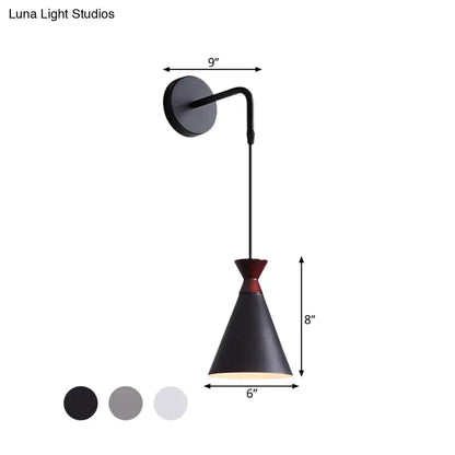Decorbites black conical iron minimalist wall sconce with 9in arm reach, 8in tall cone shade on Tampa Home & Garden Store