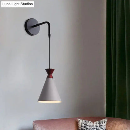 Black conical iron minimalist wall sconce with white shade and red accent by Decorbites on Tampa Home & Garden Store