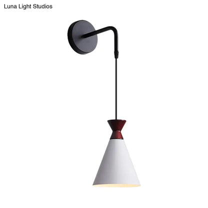 Black iron conical minimalist sconce with hanging white shade and red accent by Decorbites on Tampa Home & Garden Store