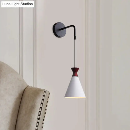 Black conical iron minimalist wall sconce by Decorbites with white shade and red accent on Tampa Home & Garden Store