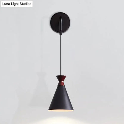 Black conical iron minimalist sconce by Decorbites on Tampa Home & Garden Store