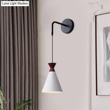 Black conical iron minimalist sconce with white shade and red neck, wall mounted on Tampa Home & Garden Store