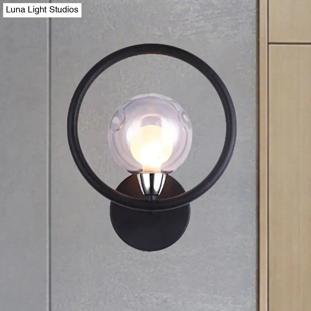 Black glass ball wall sconce with circular ring and clear globe bulb Decorbites on Tampa Home & Garden Store