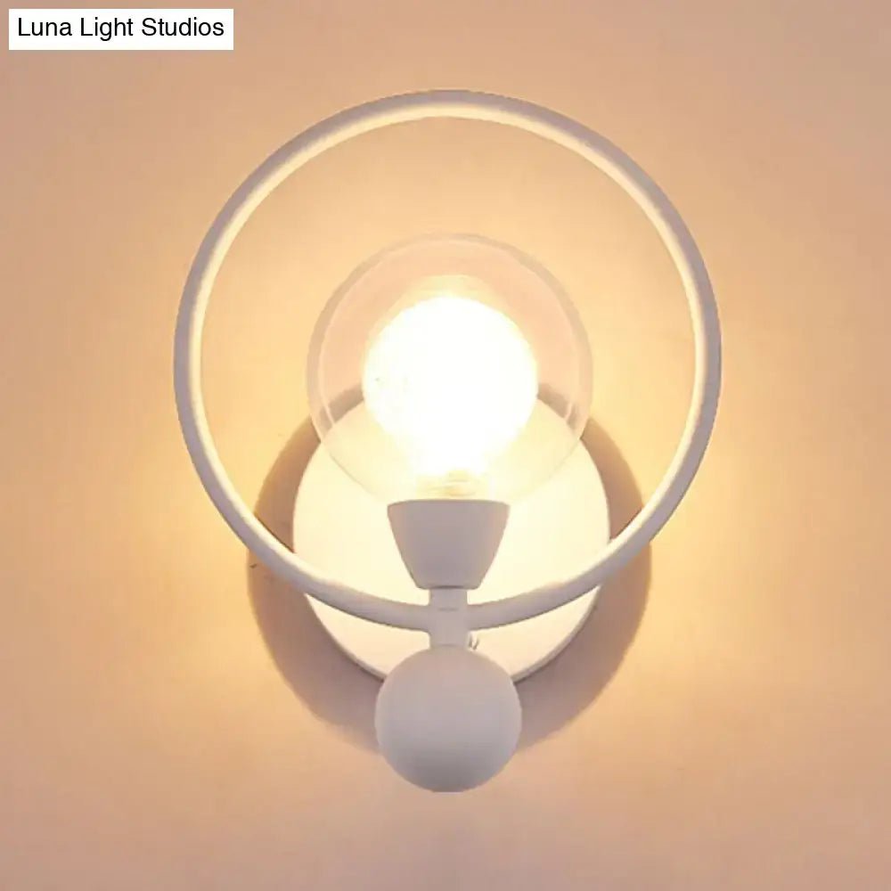 Black Glass Ball Wall Sconce by Decorbites with circular ring design and exposed bulb on Tampa Home & Garden Store