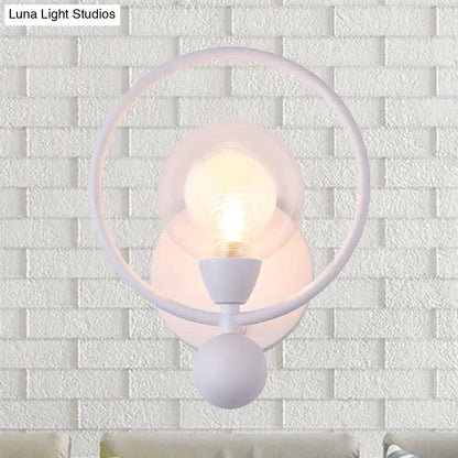 Black Glass Ball Wall Sconce with white circular ring and glowing bulb Decorbites on Tampa Home & Garden Store