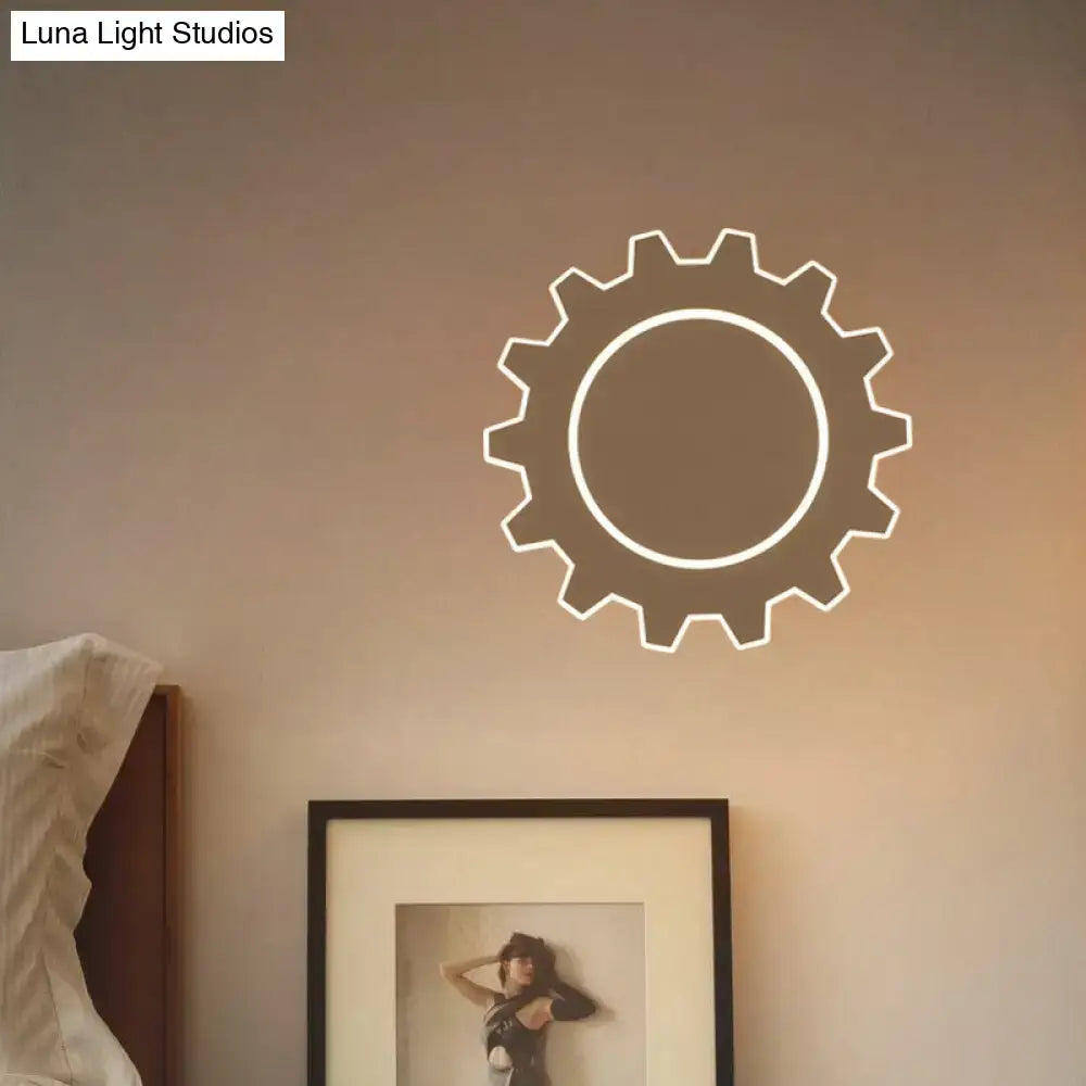 Black modern wall sconce acrylic dimmable with gear-shaped circular outline on Tampa Home & Garden Store