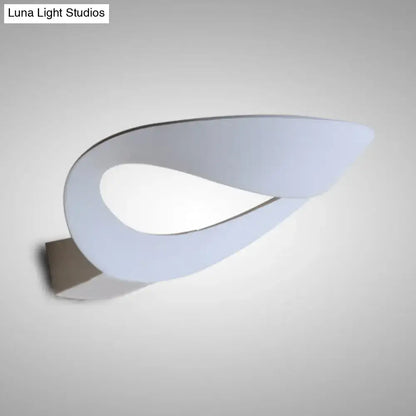 Black Oval Aluminum LED Wall Sconce with looping curved design, wall mount on Tampa Home & Garden Store