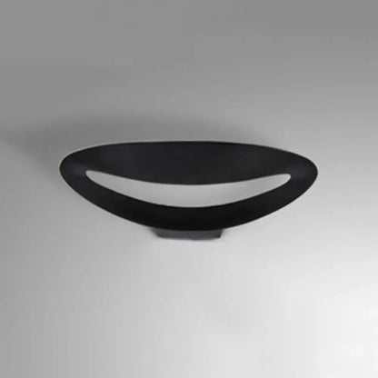 Black oval aluminum LED wall sconce with curved open-ring design Decorbites on Tampa Home & Garden Store