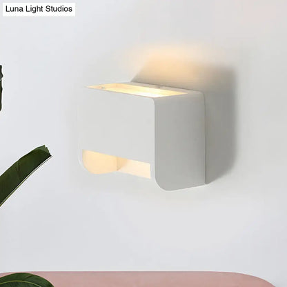 White gypsum dual-voltage wall sconce with top glow and bottom light slot on Tampa Home & Garden Store
