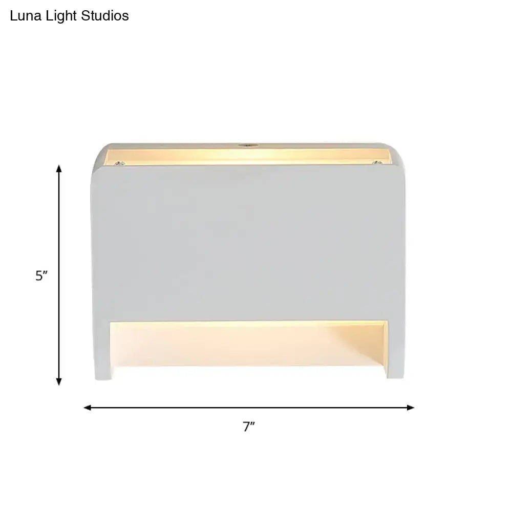 White gypsum dual-voltage wall sconce by Decorbites, warm glow, 5 in high by 7 in wide on Tampa Home & Garden Store