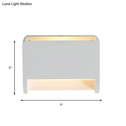 White gypsum dual-voltage wall sconce by Decorbites, warm glow, 5 in high by 7 in wide on Tampa Home & Garden Store