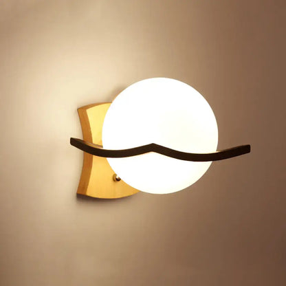 Wood Geometric Wall Sconce with white globe and curved dark arm on wood backplate Decorbites on Tampa Home & Garden Store
