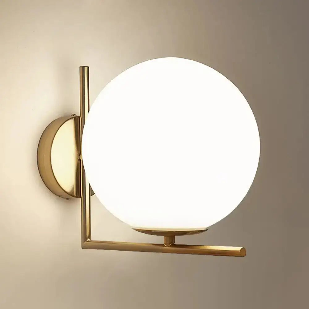 Opaline Angle Wall Sconce by Decorbites, brass-gold wall mount with a large opaline glass globe on Tampa Home & Garden Store