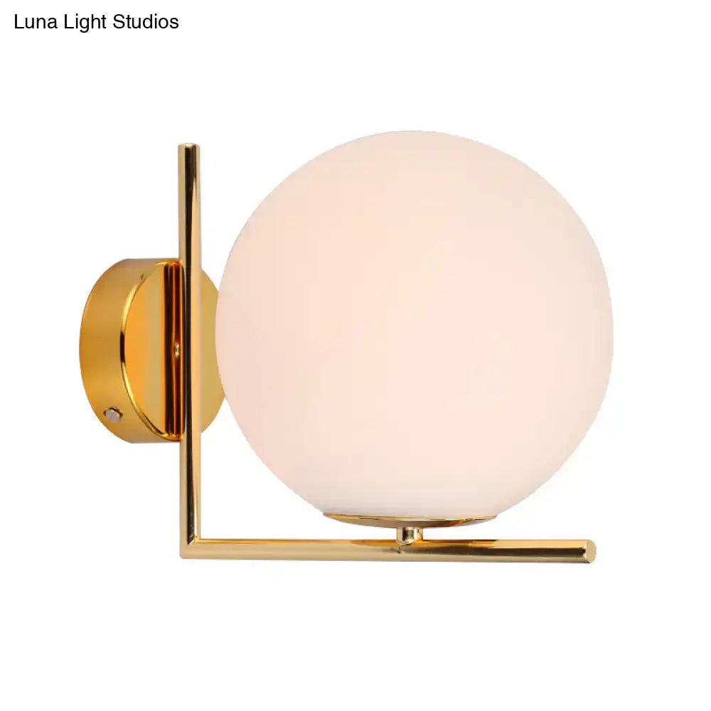Opaline Angle Wall Sconce by Decorbites, gold brass finish with frosted glass globe on Tampa Home & Garden Store
