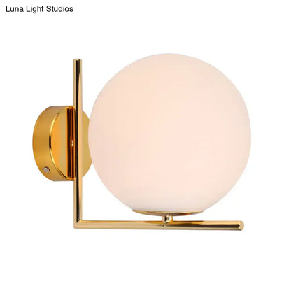 Opaline Angle Wall Sconce by Decorbites, gold brass finish with frosted glass globe on Tampa Home & Garden Store