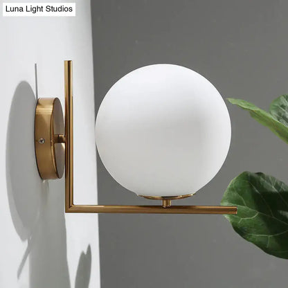 Opaline Angle Wall Sconce brass frame with opaline glass globe Decorbites wall mounted on Tampa Home & Garden Store