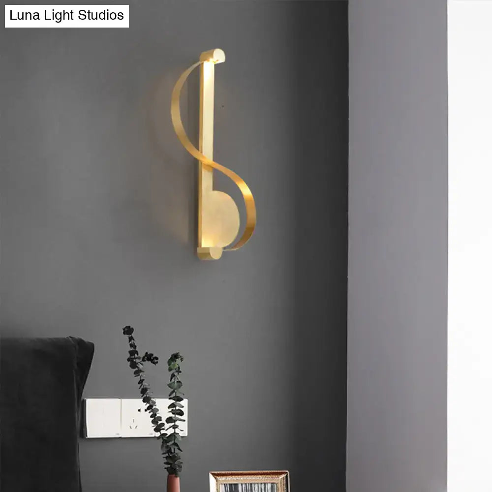 Brass Curve Wall Light by Decorbites; gold finish with curved brass ribbon design on Tampa Home & Garden Store
