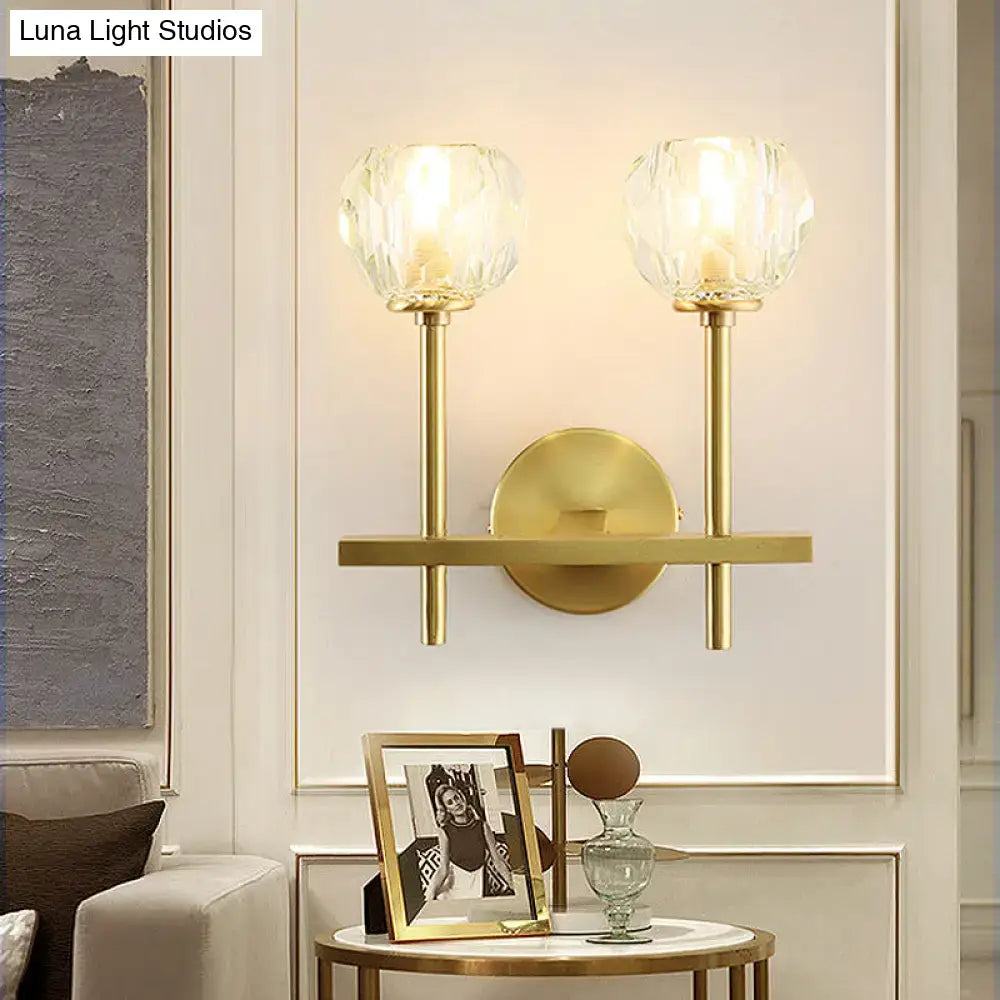 Brass crystal wall sconce with twin glass globe shades and gold finish by Decorbites on Tampa Home & Garden Store