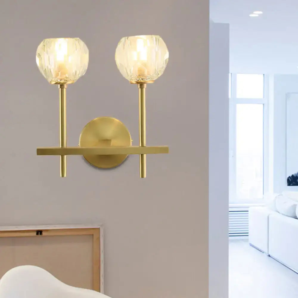 Brass crystal wall sconce with dual faceted glass shades by Decorbites on Tampa Home & Garden Store