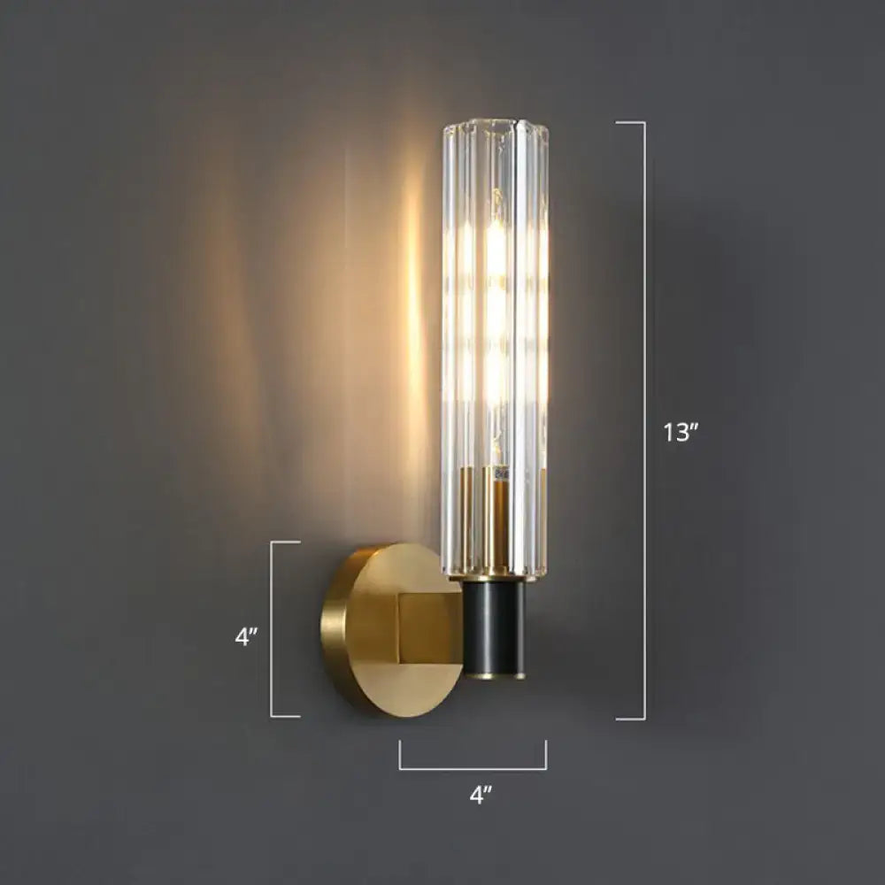 Brass tubular wall sconce by Decorbites with ribbed glass shade, 13in tall on Tampa Home & Garden Store