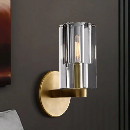 Brass ribbed glass wall sconce with clear glass shade and gold mount by Decorbites on Tampa Home & Garden Store