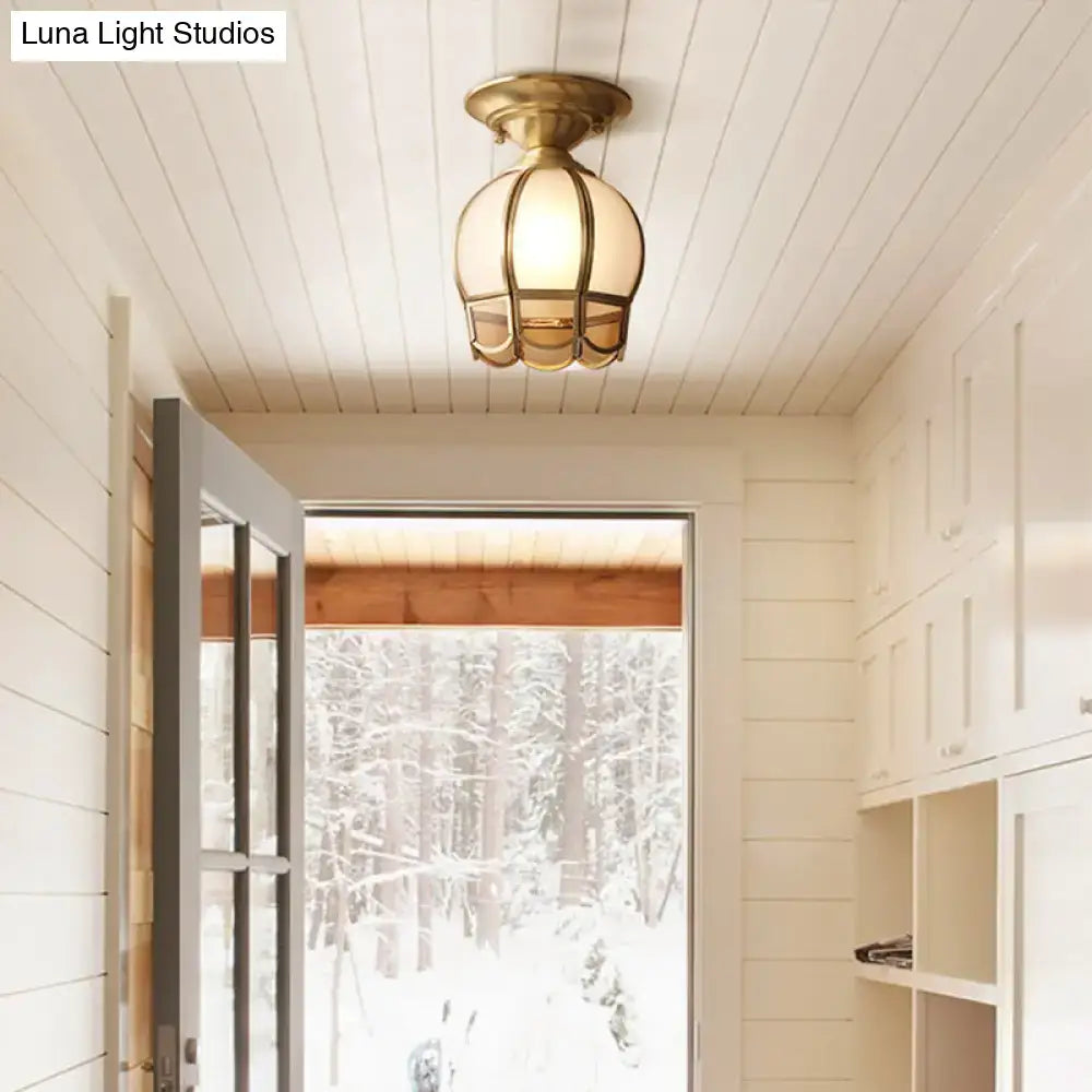 Brass scalloped flush mount light by Decorbites with glass panels in white hallway on Tampa Home & Garden Store