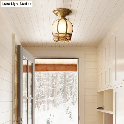 Brass scalloped flush mount light by Decorbites with glass panels in white hallway on Tampa Home & Garden Store
