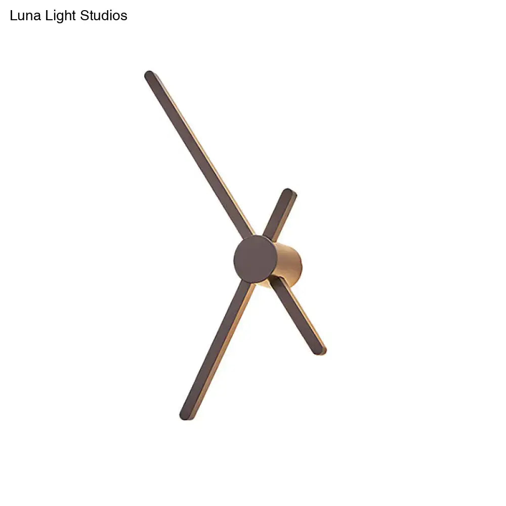 Brown modern wall sconce Decorbites bronze-finish metal with angular X-style arms on Tampa Home & Garden Store
