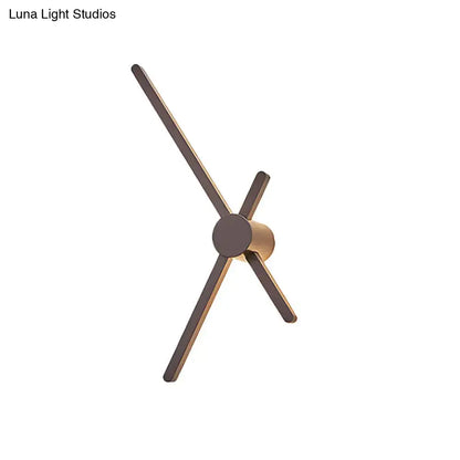 Brown modern wall sconce Decorbites bronze-finish metal with angular X-style arms on Tampa Home & Garden Store