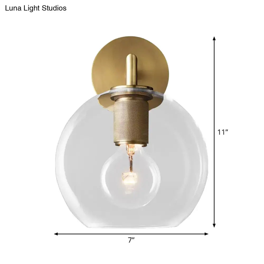 Bronze Glass Wall Sconce with round clear globe and brass base Decorbites on Tampa Home & Garden Store