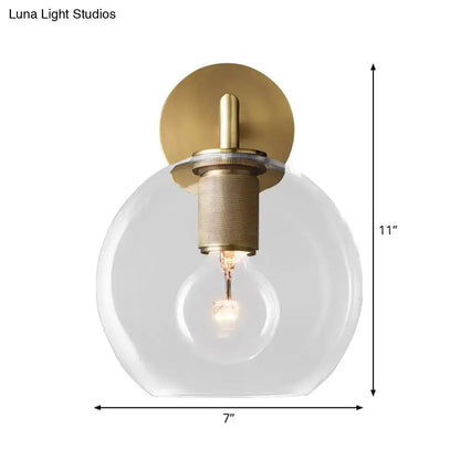 Bronze Glass Wall Sconce with round clear globe and brass base Decorbites on Tampa Home & Garden Store