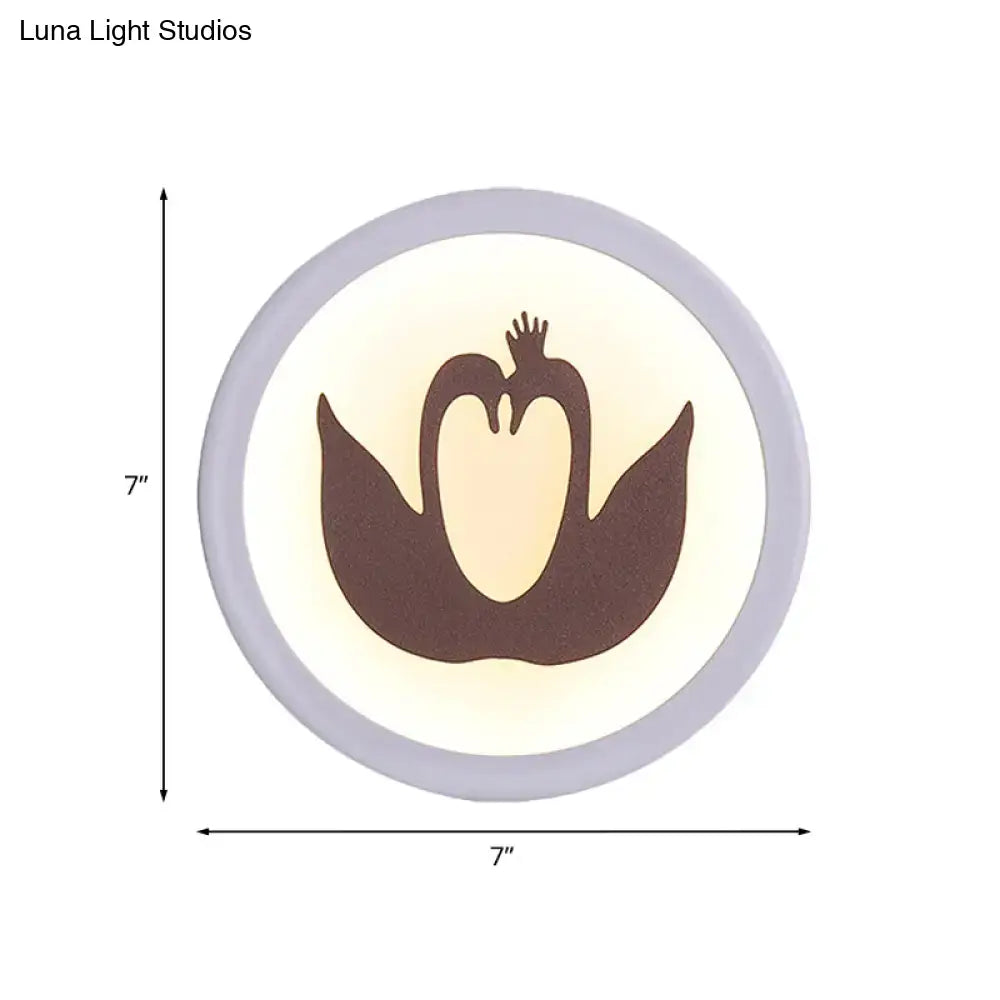 Brown Swan Wall Light sconce by Decorbites; circular 7in display with warm backlit glow on Tampa Home & Garden Store