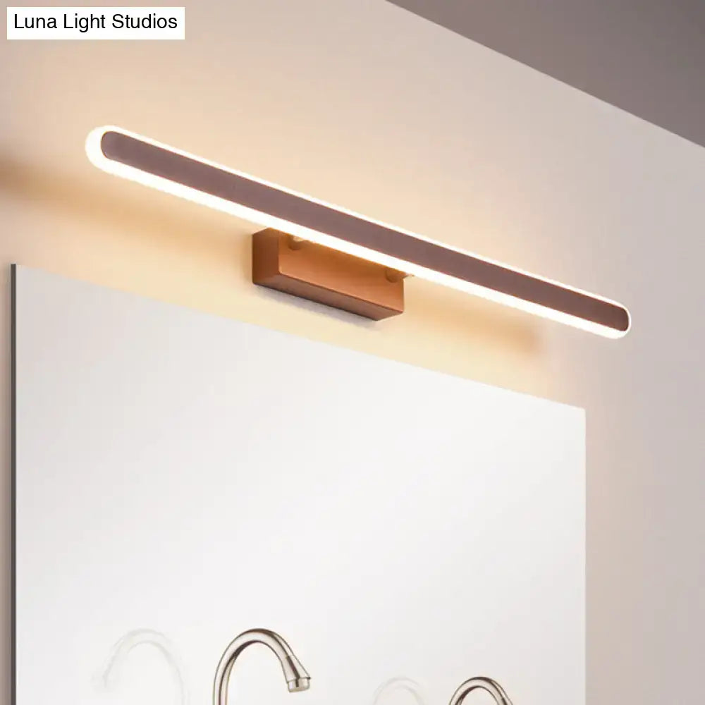 Decorbites brown LED vanity sconce; long rounded LED bar with wood mount above bathroom mirror on Tampa Home & Garden Store