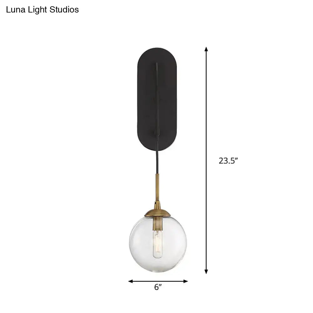 Black Glass Wall Sconce Industrial Aesthetic with black backplate, clear glass globe Decorbites on Tampa Home & Garden Store
