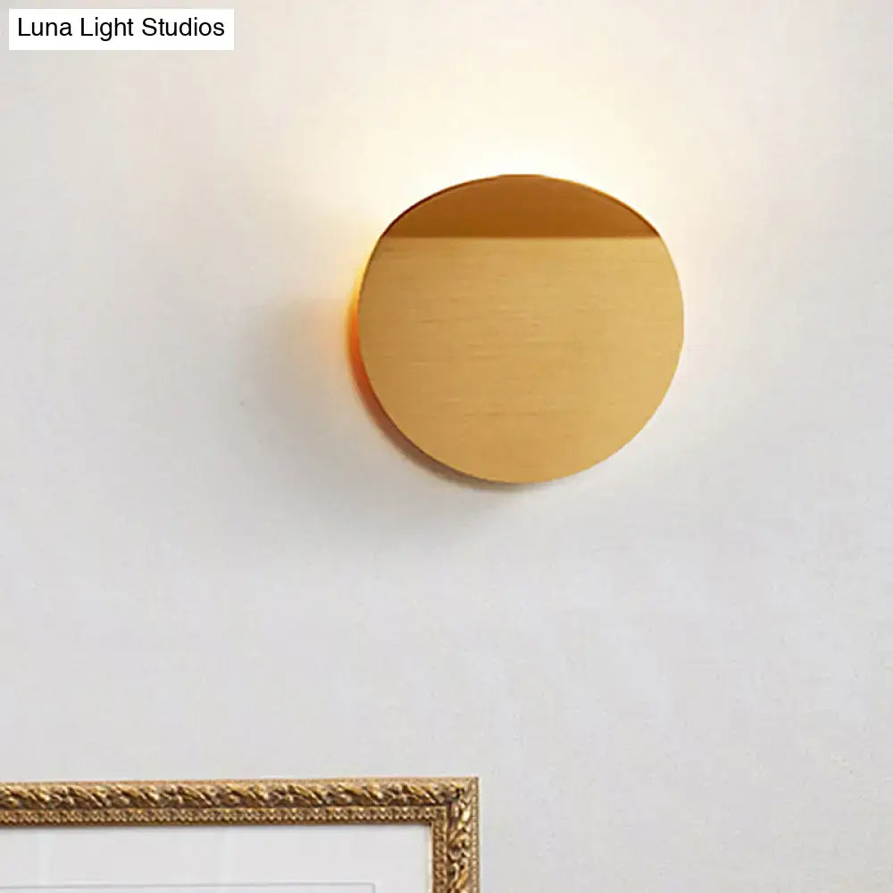 Copper round wall sconce light by Decorbites with warm glow on wall on Tampa Home & Garden Store