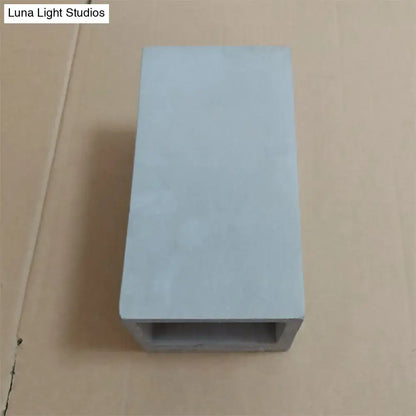 Grey cement wall light by Decorbites, rectangular block with open bottom channel on Tampa Home & Garden Store