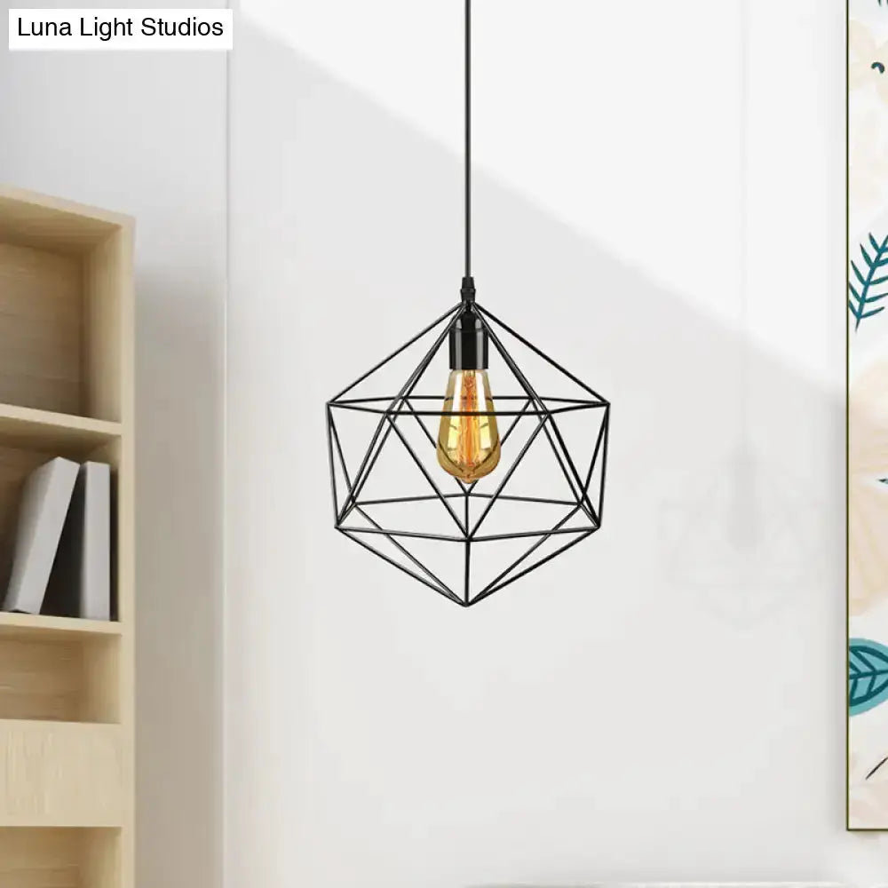 Minimalist geometric metal pendant light in black with Edison bulb over a living room setup on Tampa Home & Garden Store