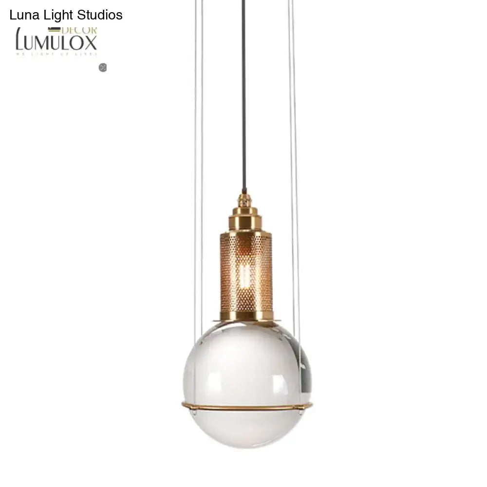 Brass Crystal Globe Pendant with clear glass globe and gold mesh neck by Decorbites on Tampa Home & Garden Store