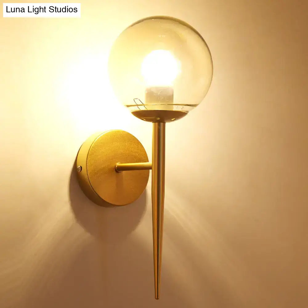Gold glass globe wall sconce with brass backplate by Decorbites on Tampa Home & Garden Store