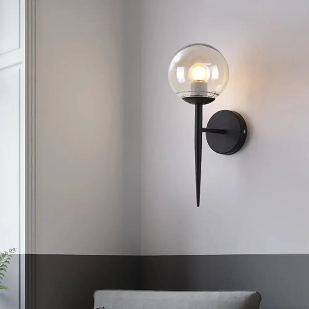 Gold Black Glass Sconce with black metal wall mount and clear glass globe on Tampa Home & Garden Store