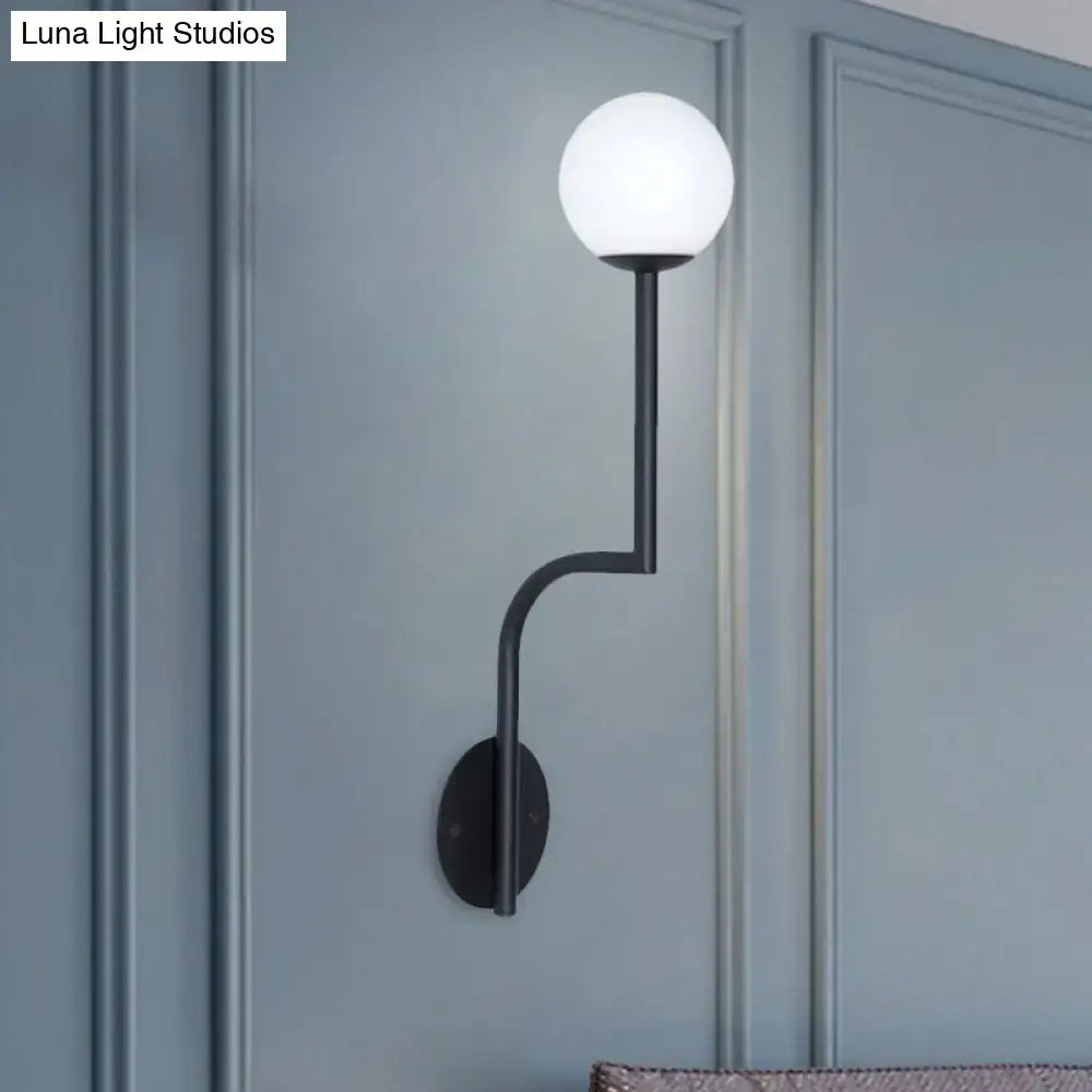 Opal glass curved sconce with black metal arm and white globe wall light on Tampa Home & Garden Store