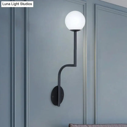 Opal glass curved sconce with black metal arm and white globe wall light on Tampa Home & Garden Store