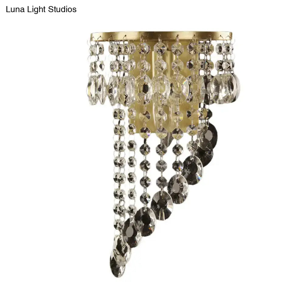 Gold brass wall sconce with cascading crystal bead strands on Tampa Home & Garden Store