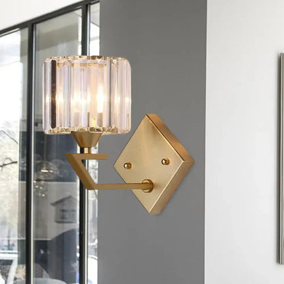 Gold crystal block cylindrical sconce with clear faceted shade by Decorbites on Tampa Home & Garden Store